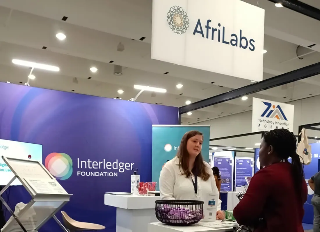 A conversation taking place at the Interledger booth at the AfriLabs Gathering